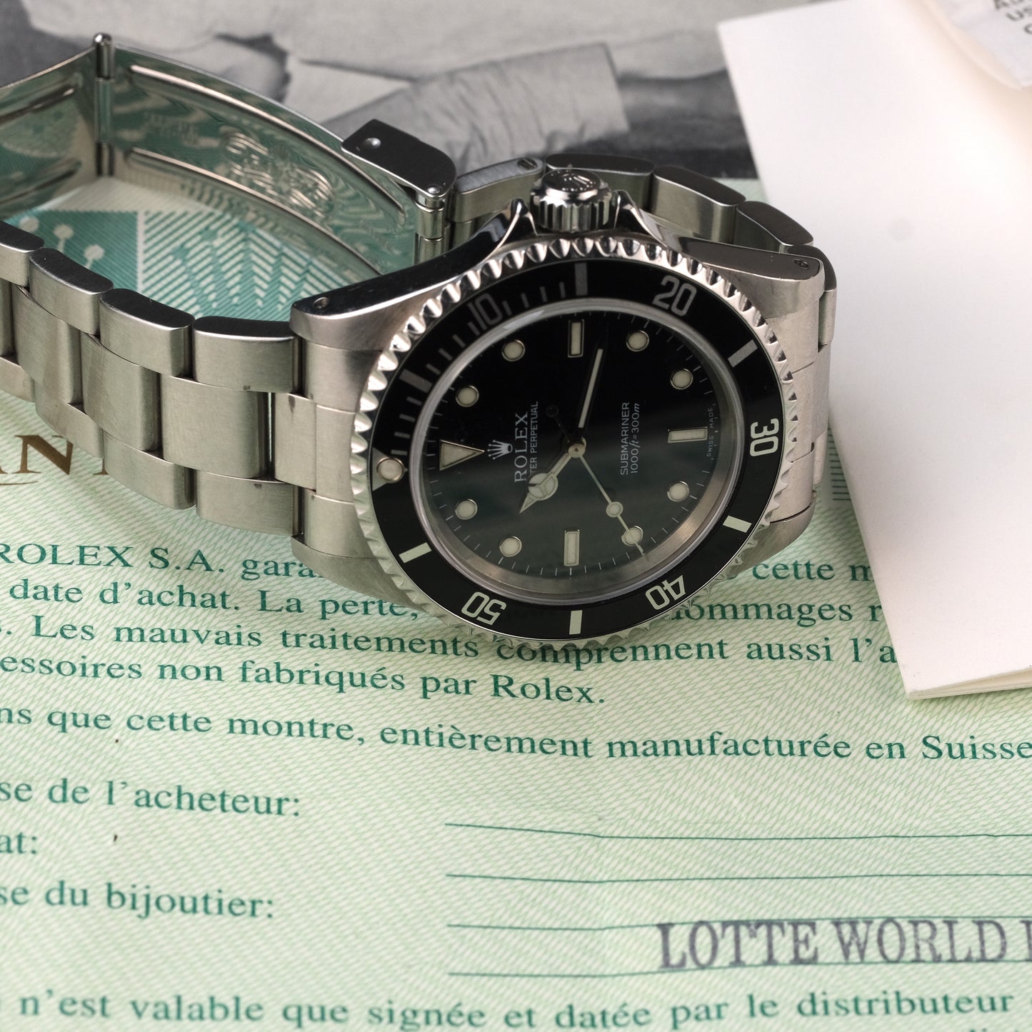 2002 Rolex Submariner 14060m with original papers