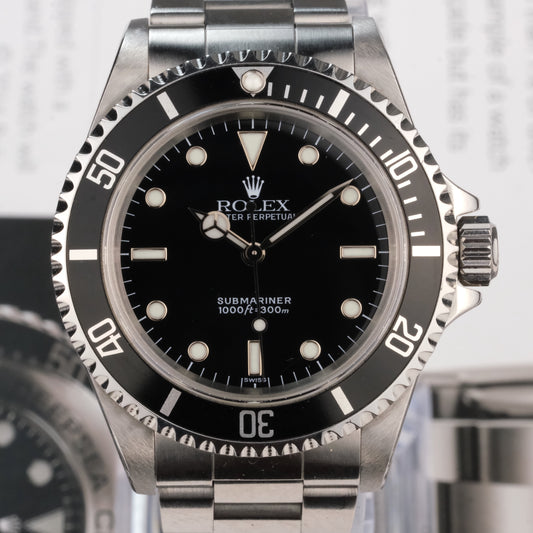 Circa 1999 Rolex Submariner 14060 with original box and papers