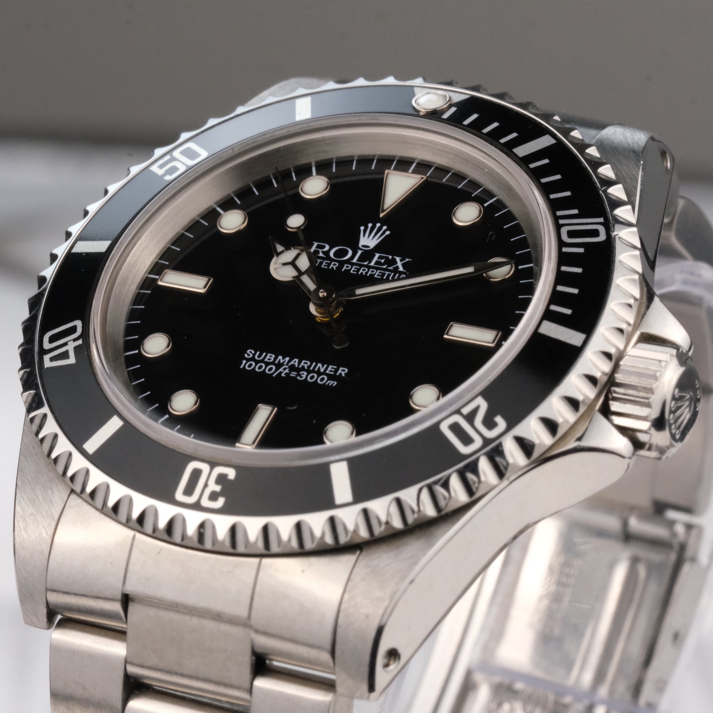 Circa 1999 Rolex Submariner 14060 with original box and papers