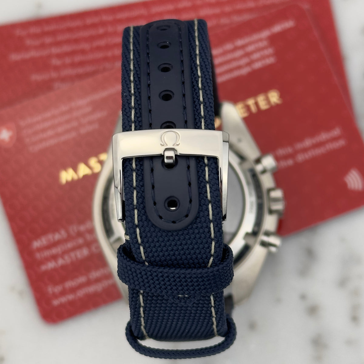2026 Omega Speedmaster "Silver Snoopy Award" 50th Anniversary | 310.32.42.50.02.001 | Box & Papers