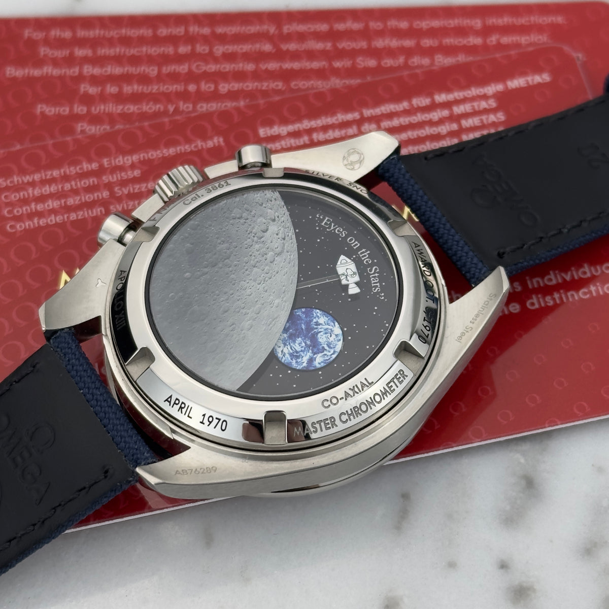 2026 Omega Speedmaster "Silver Snoopy Award" 50th Anniversary | 310.32.42.50.02.001 | Box & Papers