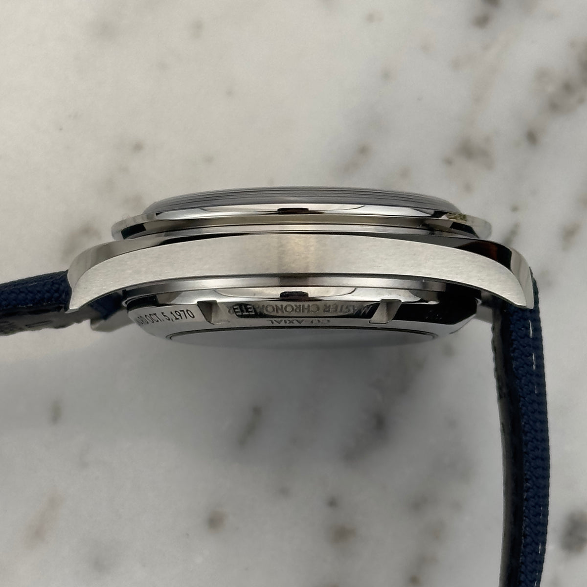 2026 Omega Speedmaster "Silver Snoopy Award" 50th Anniversary | 310.32.42.50.02.001 | Box & Papers