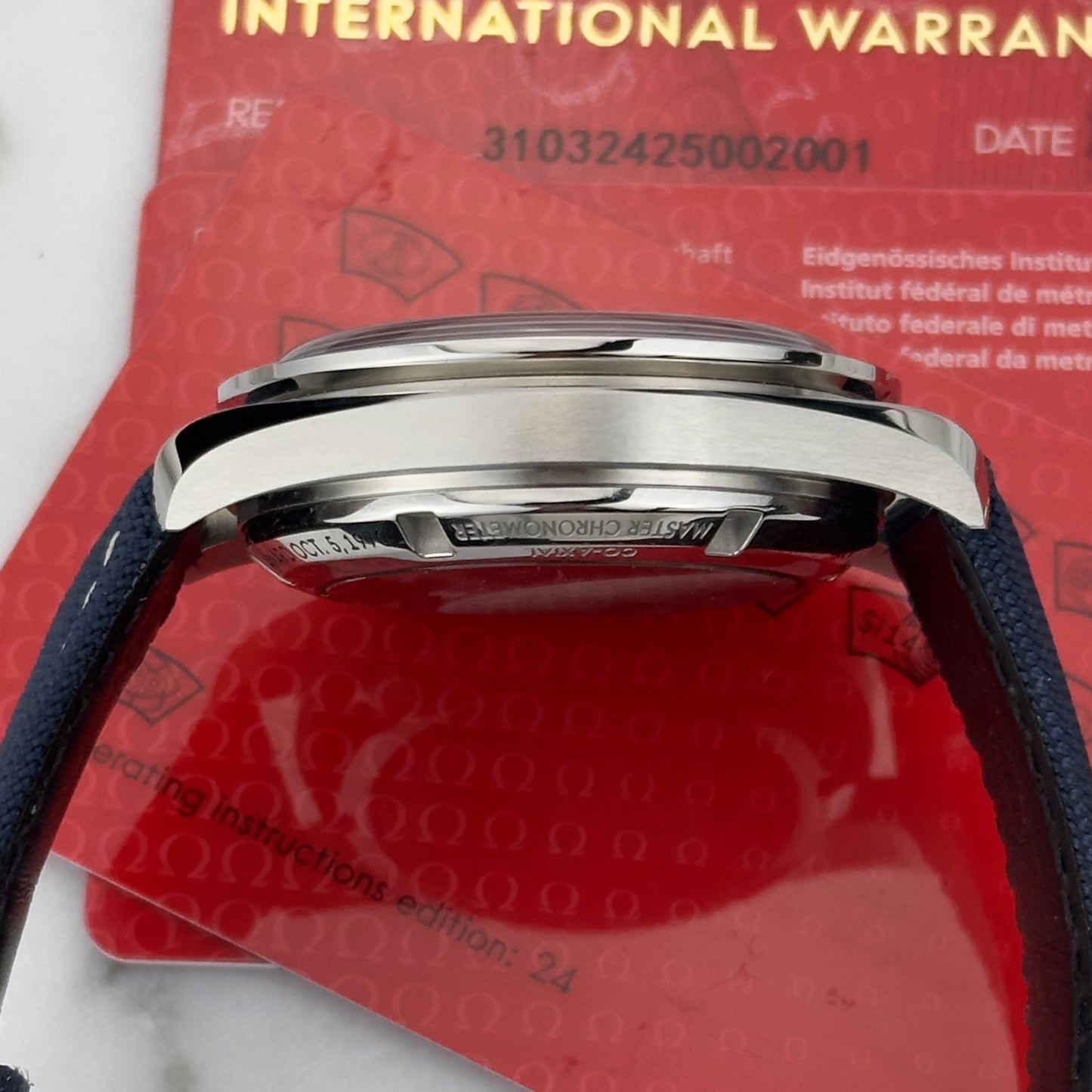 2021 Omega Speedmaster "Silver Snoopy Award" 50th Anniversary | 310.32.42.50.02.001 | Full Set