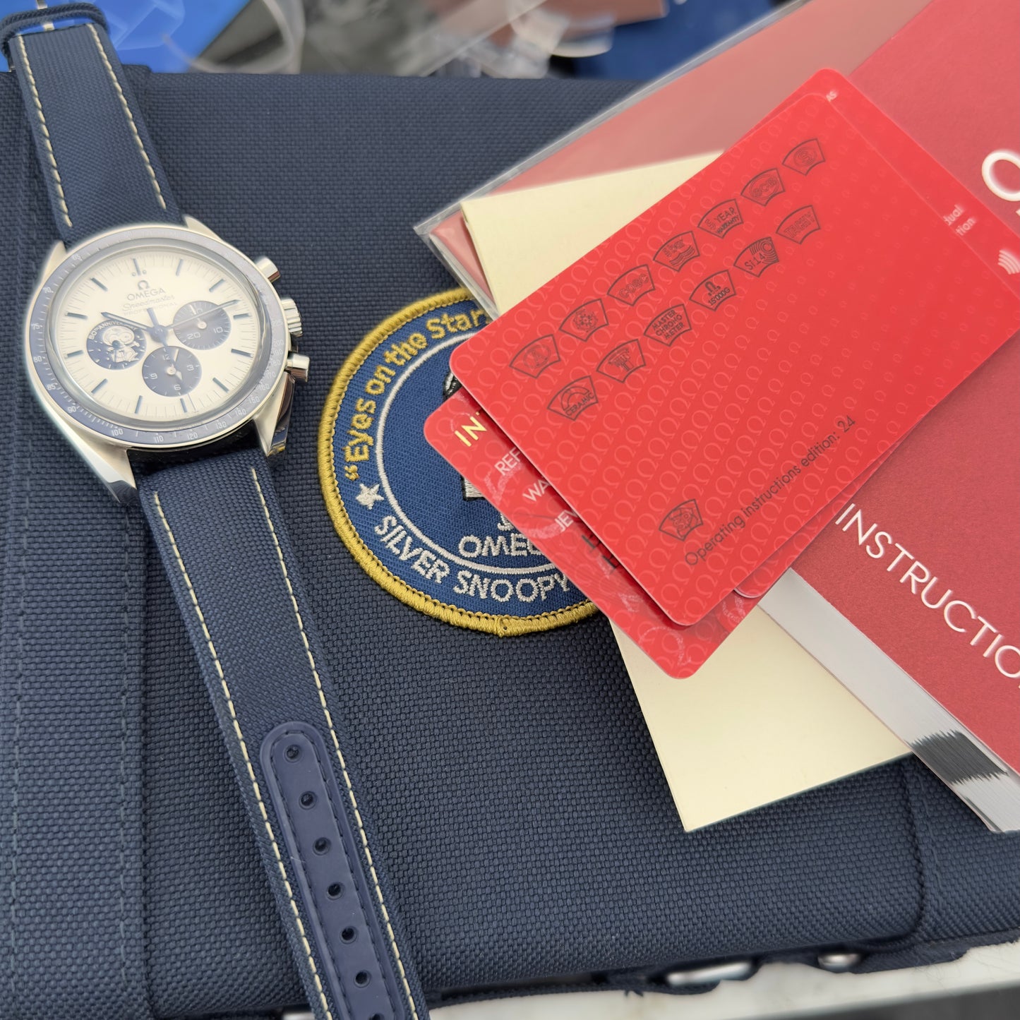 2021 Omega Speedmaster "Silver Snoopy Award" 50th Anniversary | 310.32.42.50.02.001 | Full Set
